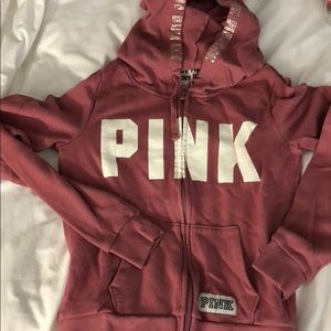 Mauve colored zip out sweatshirt